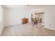 Sunlit dining room with wood floors, buffet, and room for entertaining guests at 2365 Nuremberg Blvd, Punta Gorda, FL 33983