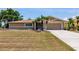 Charming single-story home featuring well-maintained landscaping and a two-car garage at 2365 Nuremberg Blvd, Punta Gorda, FL 33983