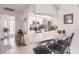 Bright kitchen features stainless steel appliances, white cabinetry, and a breakfast bar with seating at 2365 Nuremberg Blvd, Punta Gorda, FL 33983