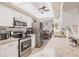 Bright kitchen boasts a ceiling fan, stainless steel appliances, and modern countertops at 2365 Nuremberg Blvd, Punta Gorda, FL 33983