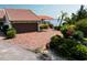 Charming waterfront home with brick-paved drive, mature landscaping, two-car garage, and access to the open bay at 25188 Marion Ave # 1, Punta Gorda, FL 33950