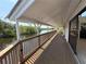 Covered porch with a view of the water, ideal for relaxing and enjoying nature at 25188 Marion Ave # 1, Punta Gorda, FL 33950