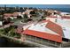 Neighborhood featuring lovely homes with red tile roofs, lush landscaping, and cul-de-sac streets near the open bay at 25188 Marion Ave # 1, Punta Gorda, FL 33950