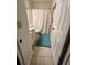 Compact bathroom with a shower/tub combo, white vanity, and a tiled floor at 2696 Gisela Rd, North Port, FL 34287