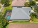 Aerial view showcasing the home's screened-in pool at 2747 Suncoast Lakes Blvd, Punta Gorda, FL 33980