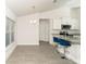 Sunlit dining area with modern decor and an inviting seating arrangement, ideal for Gathering meals at 2858 Parlay Ln, North Port, FL 34286