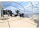 Spacious lanai features outdoor seating and panoramic views of the waterfront at 3772 Peace River Dr, Punta Gorda, FL 33983