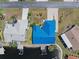 Bird's-eye view of home with metal roof, private dock and waterway access at 3825 Barnegat Dr, Punta Gorda, FL 33950