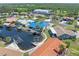 Canal-front home with a blue metal roof, private dock, and access to beautiful waterways at 3825 Barnegat Dr, Punta Gorda, FL 33950