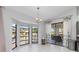 Breakfast nook area with large windows offering beautiful water views at 3825 Barnegat Dr, Punta Gorda, FL 33950