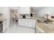 Spacious open kitchen with granite countertops and adjacent dining area at 3825 Barnegat Dr, Punta Gorda, FL 33950