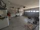 Spacious two-car garage with ample storage space and a utility sink at 4205 Simkins Ave, North Port, FL 34286