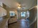 Kitchen with stainless steel appliances, granite countertops, and white cabinetry at 4205 Simkins Ave, North Port, FL 34286