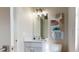 Bathroom sink and vanity with modern decor and plenty of natural light at 4426 Vasco St, Punta Gorda, FL 33950