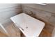 Freestanding soaking tub with sleek hardware set against decorative tile at 4426 Vasco St, Punta Gorda, FL 33950