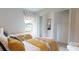 Bright bedroom with two beds, featuring a window view and neutral tones at 4426 Vasco St, Punta Gorda, FL 33950
