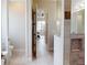 Open hallway showing a bathroom, bedroom, and natural light at 4426 Vasco St, Punta Gorda, FL 33950