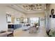 Bright living space featuring a modern design, fireplace, and seamless access to outdoor living at 4426 Vasco St, Punta Gorda, FL 33950