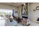Airy living space with a modern fireplace, large windows, and inviting seating arrangement at 4426 Vasco St, Punta Gorda, FL 33950