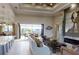 Stylish living room features modern decor, a fireplace, and a clear view to the outdoors at 4426 Vasco St, Punta Gorda, FL 33950