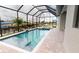Gorgeous screened pool with spa, overlooking canal at 4426 Vasco St, Punta Gorda, FL 33950
