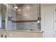 Modern shower with a glass enclosure and tiled walls providing a luxurious feel at 4426 Vasco St, Punta Gorda, FL 33950