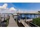 Enjoy easy access to the water with a private dock and boat lift, perfect for boating and fishing adventures at 5061 Collingswood Blvd, Port Charlotte, FL 33948