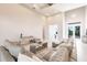 Bright and expansive living room with modern decor, perfect for entertaining guests or relaxing at 5061 Collingswood Blvd, Port Charlotte, FL 33948