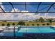 Relaxing pool and spa area showcasing the beautiful water views, perfect for outdoor enjoyment at 5061 Collingswood Blvd, Port Charlotte, FL 33948
