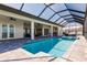 Pool, hot tub, patio and water views make this backyard ideal for entertaining or simply relaxing in solitude at 5061 Collingswood Blvd, Port Charlotte, FL 33948