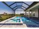 Relax and unwind in your screened pool and jacuzzi, enjoying the sun or the shade in your backyard at 5061 Collingswood Blvd, Port Charlotte, FL 33948