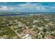 This aerial view showcases the home's location in a serene neighborhood with access to water views at 5219 Guava Ter, Port Charlotte, FL 33981