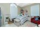 Bright bedroom with a large window, area rug, and a cozy bed at 5219 Guava Ter, Port Charlotte, FL 33981