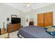 Bedroom features wicker furniture and is brightly lit by natural light at 5219 Guava Ter, Port Charlotte, FL 33981
