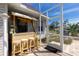 Charming outdoor bar with bamboo accents, perfect for entertaining guests in a relaxed setting at 5219 Guava Ter, Port Charlotte, FL 33981