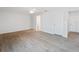 Neutral-toned bedroom featuring tile floors, and two doors, leading to a bathroom and closet at 5353 Kaspar St, Port Charlotte, FL 33981