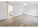 Spacious bedroom features tile flooring and an open doorway to the ensuite bathroom at 5353 Kaspar St, Port Charlotte, FL 33981