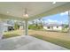 Covered patio overlooking a spacious backyard at 5353 Kaspar St, Port Charlotte, FL 33981