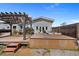 Exterior view of back of house featuring a deck with pergola and a hot tub at 5600 Blackjack S Ct, Punta Gorda, FL 33982