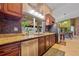 Bright and airy kitchen featuring stainless steel appliances and views to the dining area at 5600 Blackjack S Ct, Punta Gorda, FL 33982