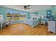 Serene main bedroom with a large window view and comfortable furnishings at 5600 Blackjack S Ct, Punta Gorda, FL 33982