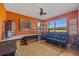 Inviting office with bright walls, modern desk, and comfortable seating area at 5600 Blackjack S Ct, Punta Gorda, FL 33982