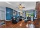 Comfortable living room with hardwood floors, beachy decor, and neutral-toned walls at 566 Reading Nw St, Port Charlotte, FL 33952