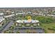Aerial view of condo with parking and nearby canal residences in a well-maintained, desirable neighborhood at 601 Shreve St # 64C, Punta Gorda, FL 33950