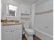 Bathroom with a vanity, toilet, and a shower and tub combo at 601 Shreve St # 64C, Punta Gorda, FL 33950