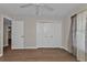 Bedroom with wood flooring and standard double door closet at 601 Shreve St # 64C, Punta Gorda, FL 33950