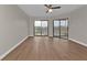Open living room with a ceiling fan and glass doors leading to the outside at 601 Shreve St # 64C, Punta Gorda, FL 33950