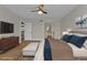 Spacious main bedroom featuring wood floors and an ensuite bathroom at 601 Shreve St # 64C, Punta Gorda, FL 33950