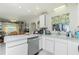 Functional kitchen with stainless steel appliances, ample counter space, and bright natural light, ideal for everyday cooking at 6103 Fabian Rd, North Port, FL 34287