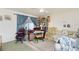 Comfortable living room with plush seating, natural light, and access to outdoor space at 6103 Fabian Rd, North Port, FL 34287
